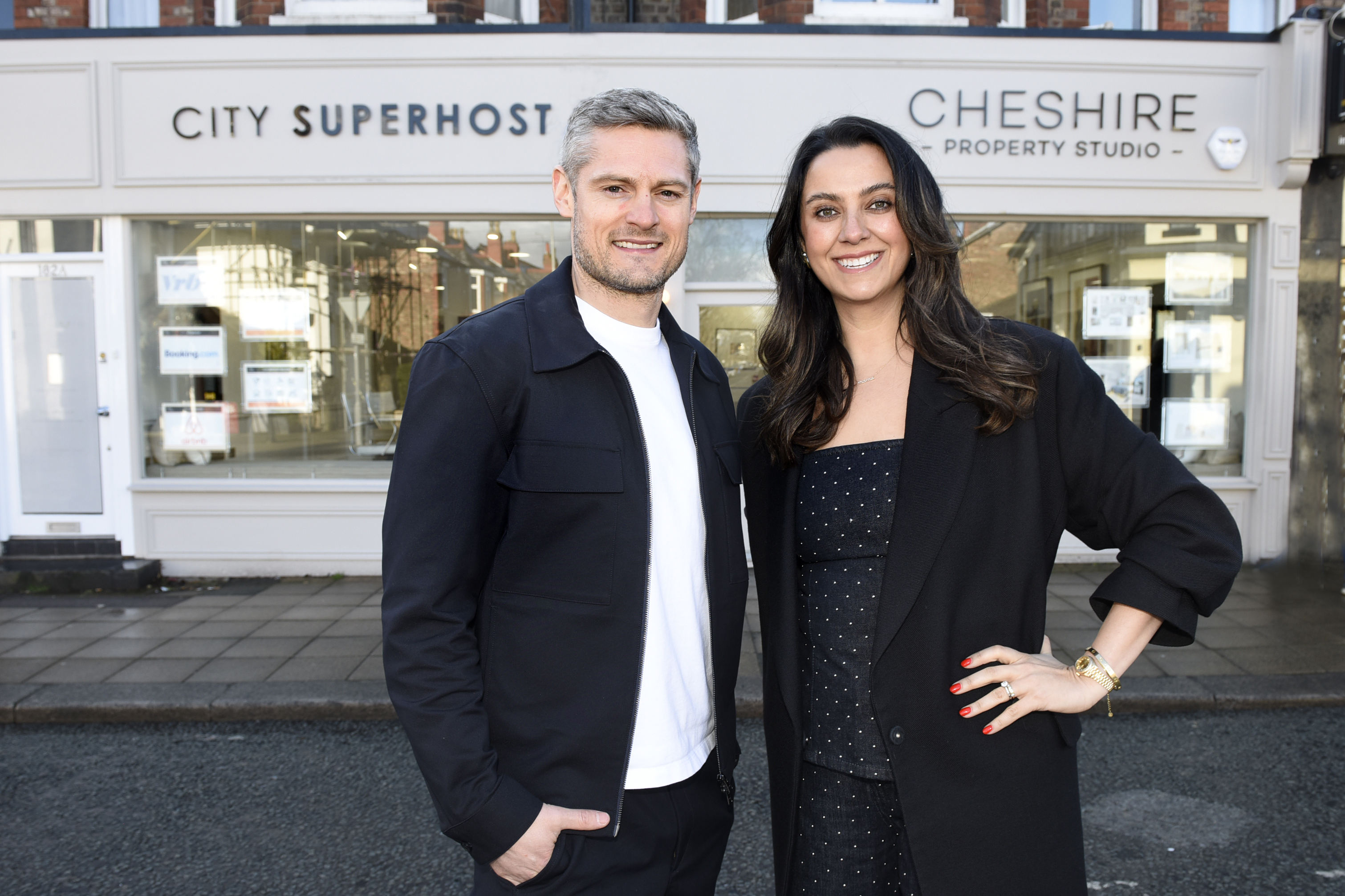 Matt and Steph outside the City Superhost office on Ashley Road, Hale